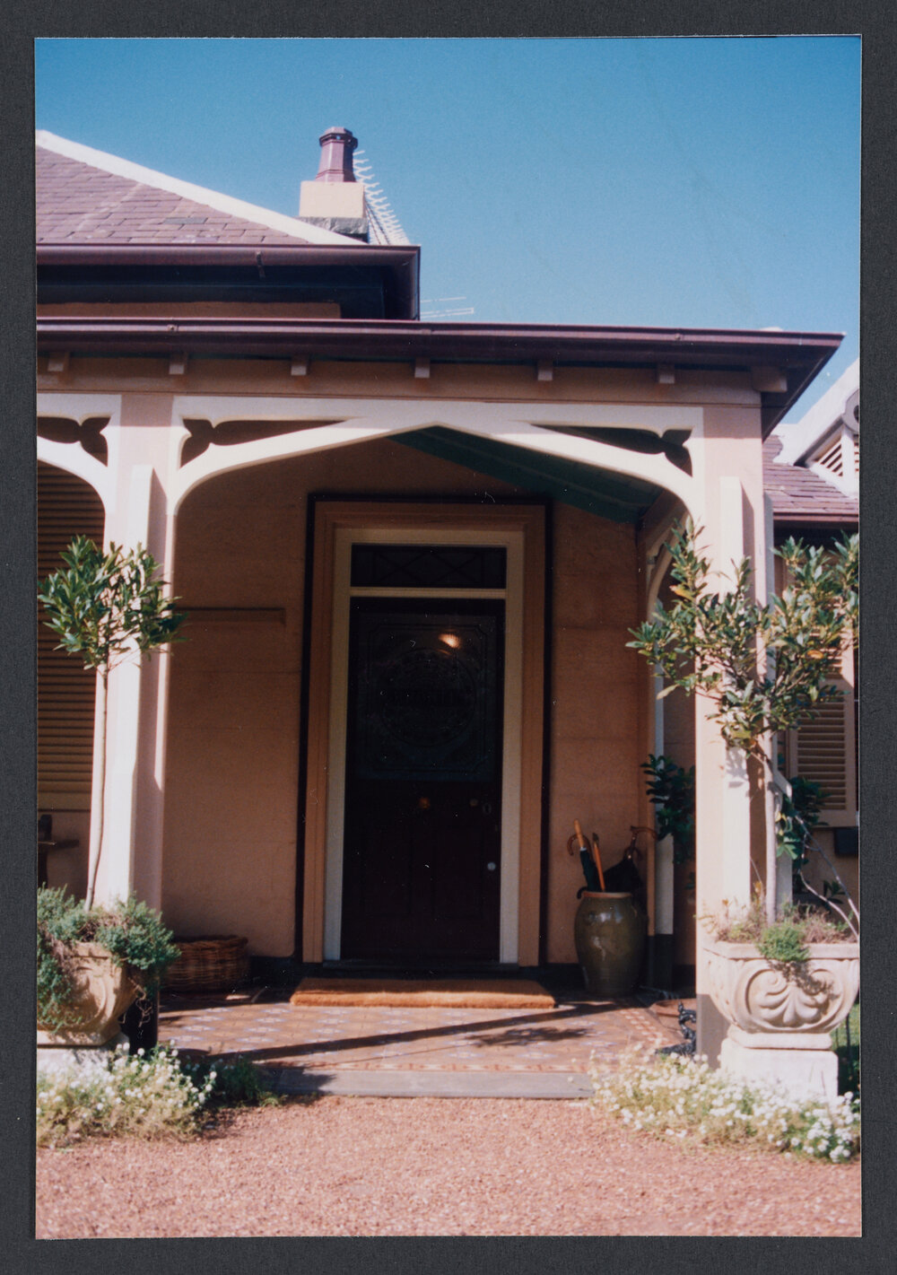 South - West ( front ) verandah. Door has "Bronte" etched in glass. Open day
