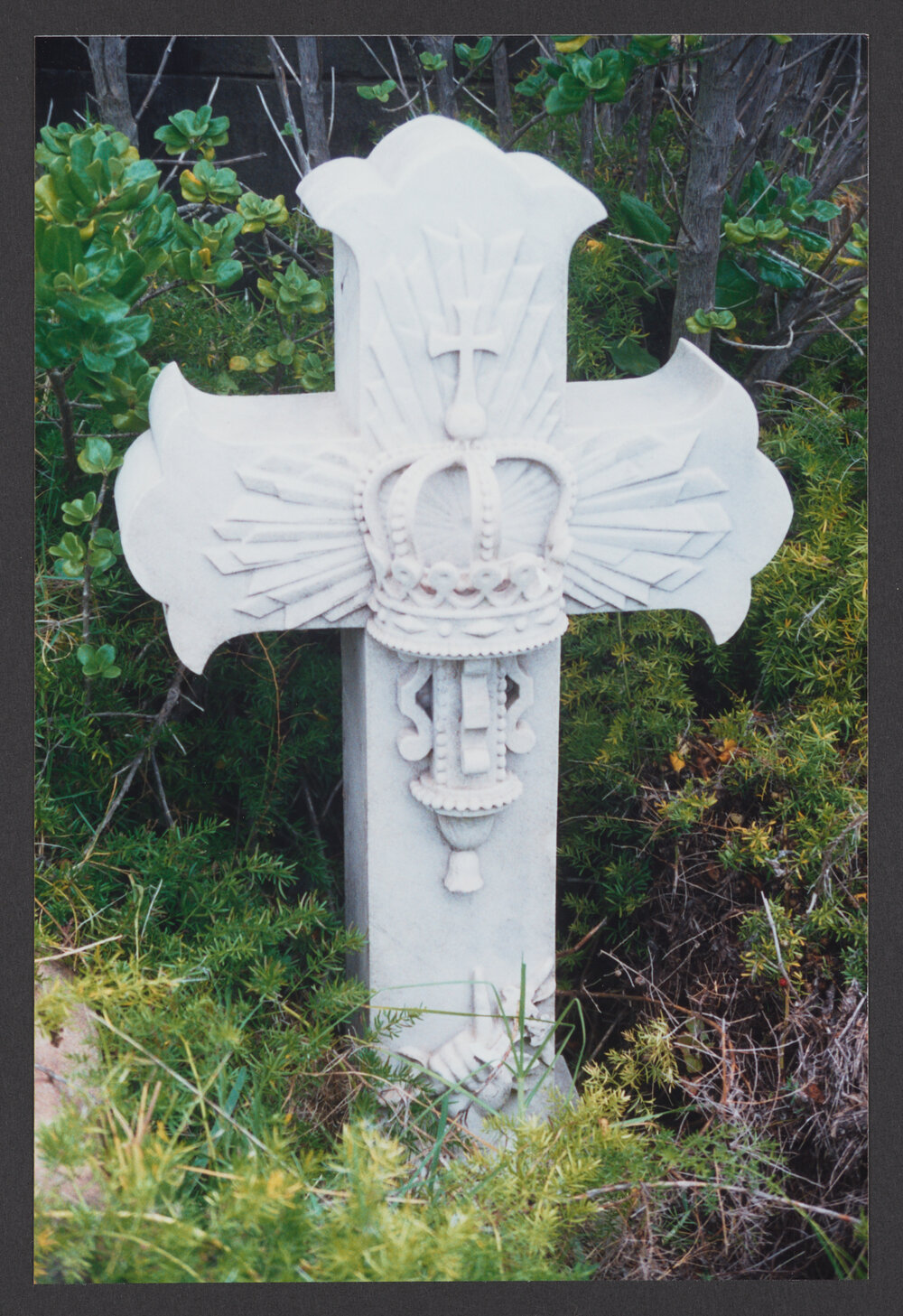White marble cross with crown