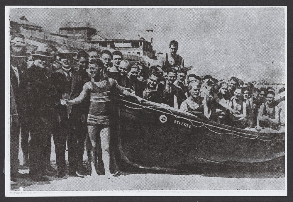 North Bondi S.L.S.C. , launching of the Club's new surf boat " Referee." At left Honary Hugh D. McIntosh, MLC, congratulates crew's captain and the Boat's inventor, Mr F. A. Hammer, is seated in the boat.
