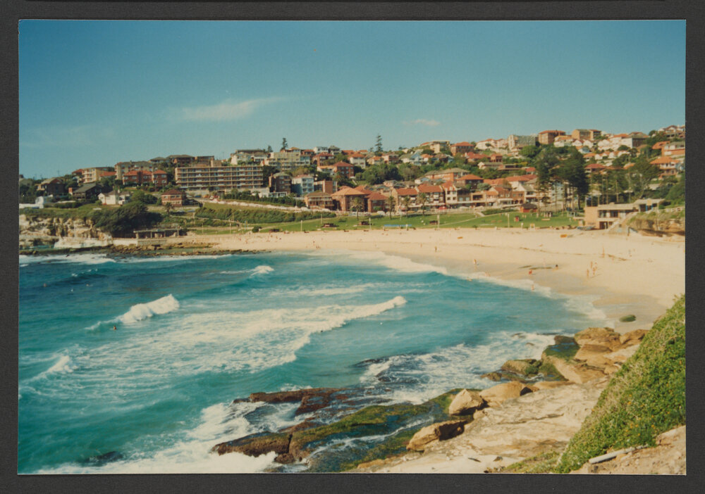 Bronte beach, looking south to baths, park and Surf Club. Suburban residences.