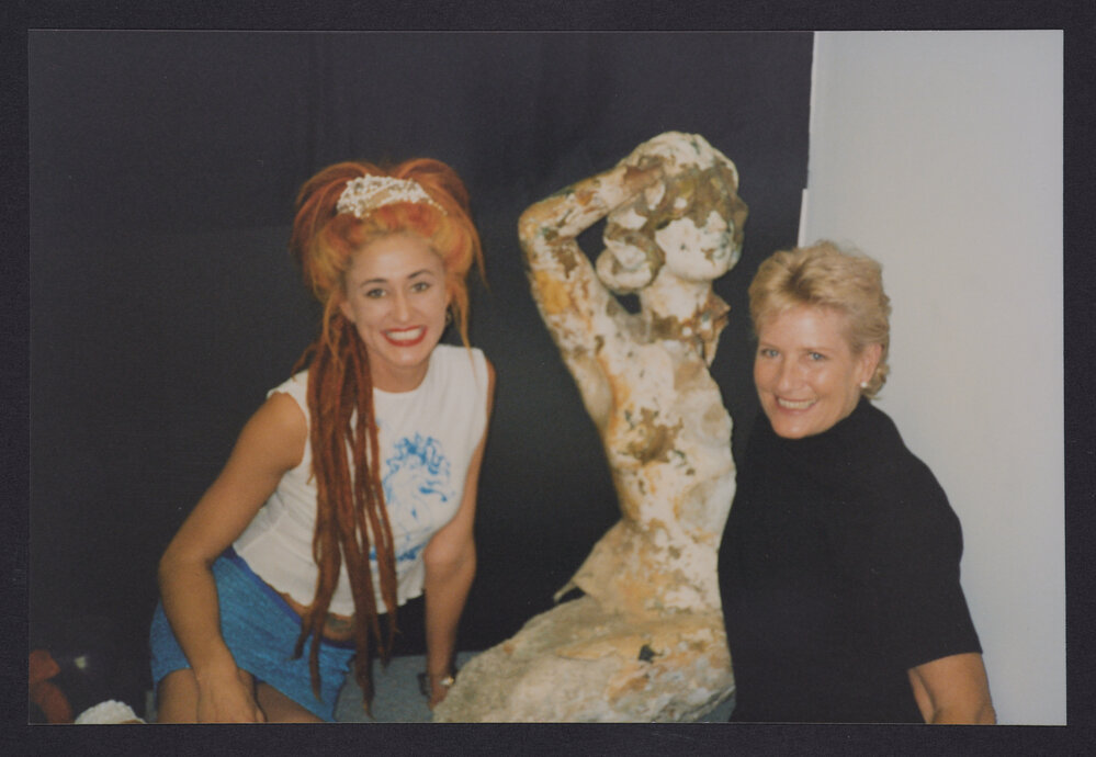 Ben Buckler, mermaid statue housed at Waverley library, with ( right) Mrs Jan Percival (nee carmody) who originally posed for statue, and Bondi Artist Lizmania.