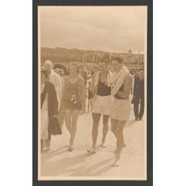 Both men, Tom Meagher, on the left and Reg Stevens, the right, are wearing Beach Inspector uniforms. Reg Stevens was a member of Bondi SBLSC. He was also a member of the successful 1928 - 29 Open Surf Team. It appears that they may have just competed in a
