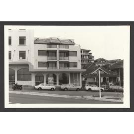 Units above shops and semi - detached houses in Sir Thomas Mitchell Road, Bondi beach, corner Campbell Parade.
