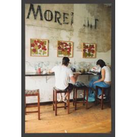 Businesses - Brighton Boulevard, Bondi Beach, Interior "Eat M?" restaurant 98 - 102 Brighton Boulevade, Bondi. 2 Customers seated at " Eating bar".