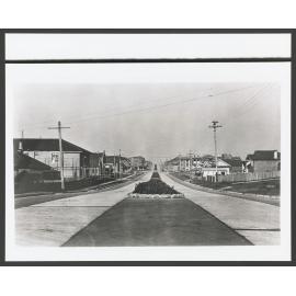 Blair Street, Bondi with centre strip of Canna Lillies.
