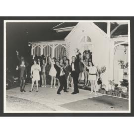 Wedding reception of Bill and Marian Pringle. Guest outside Bronte House.