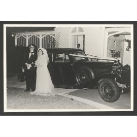 Bride and Groom; Bill and Marian Pringle (nee Goodrum) and wedding car. Bronte House driveway.