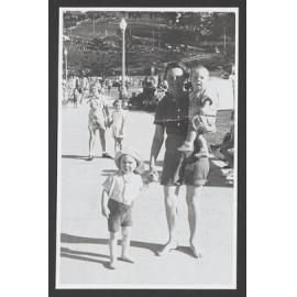 Jessie Ethel Corry, with sons Allan (standing) and Graham (in arms) at Bronte beach.