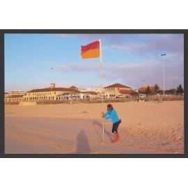 Dawn Photo of Lifeguard setting flags. New Years Day 2006