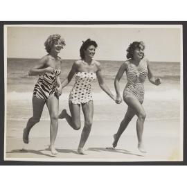 Miss Bondi; Olive Leighton 1945, far right. Running on Bondi beach in bathers