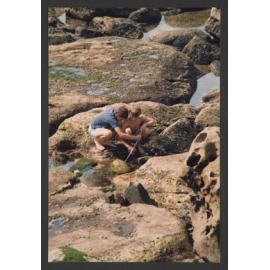 Bronte beach bogey hole rocks. Boys searching for crabs.