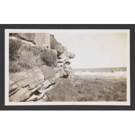 Tamarama Beach and cliffs with lady