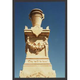 Urn on flowered pedestal