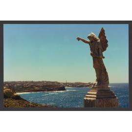 Angel on shrouded pedestal with MacKenzie and Ben Buckler Headland