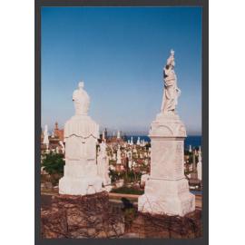 Draped urn on pedestal and figure on a pedestal