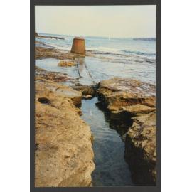 Bondi beach, storm water outlet and channel, rocks. North Bondi