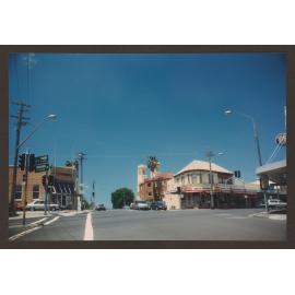 Charing Cross, buildings and shopfronts. Intersection of Bronte Road, Victoria Street and Carrington Road, Waverley. Church Spires (white) Mary Immaculate Roman Catholic Chruch, Westpac bank (left). Novmeber 1995