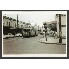 Tram in street scene