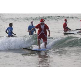 Most surfing Santas
